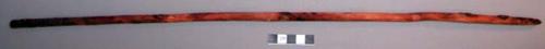 Wood, Prayer stick, pointed at one end, painted red, with unpainted stripe at to