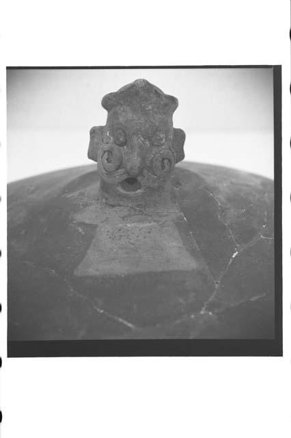 Mound B, Tomb V, Cat#B14. Effigy pot lid handle, front