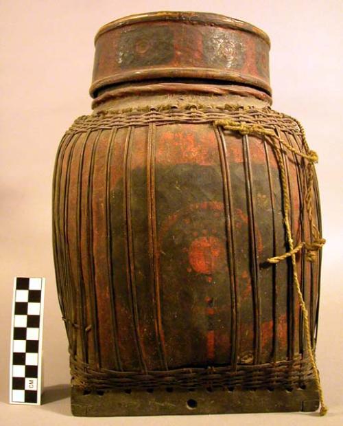 Cylindrical twilled basket, heavily lacquered