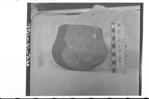 Fragmentary Double-Curved Brown Clay Jar