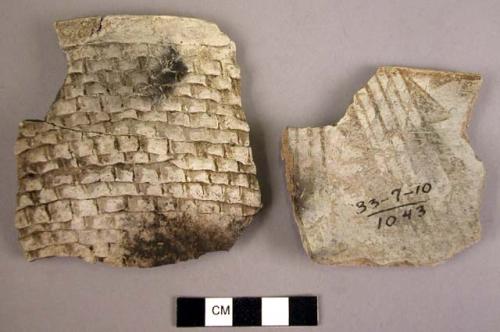 Part of bowl with corrugation outside and black-on-white decoration inside