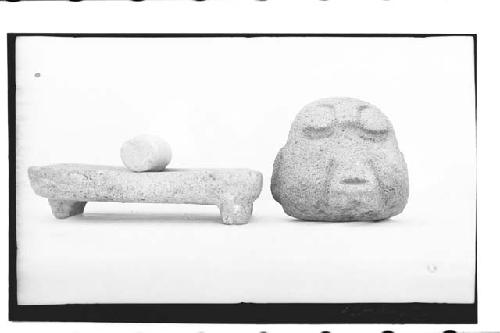 Mound B, Tomb V-metate and mano (Cat#B82) and stone head (Cat#B18)