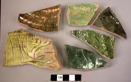 8 potsherds - green glaze