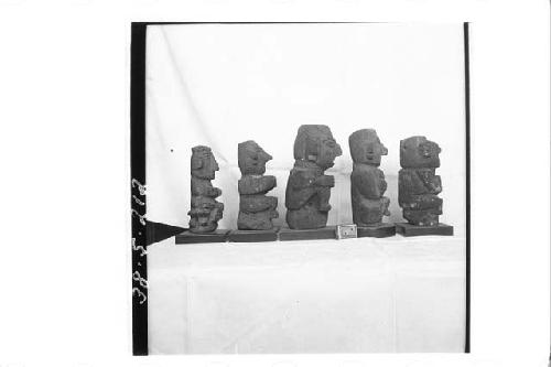 Five small stone figures (right profile)