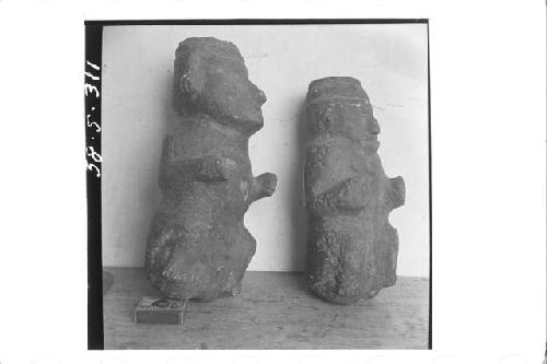 Right profile of 2 small stone figures