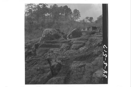 Pornographic figure, steps and column carved out of bed rock