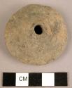 Ceramic complete spindle whorl, conical, red-brown, chipped, worn