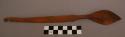 Spoon, carved wood, pointed, ridged ladle, incised designs on handle