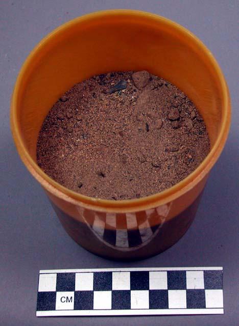 Soil sample in plastic canister