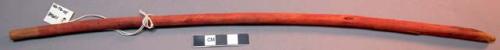 Wood, Prayer stick, pointed at one end, painted red, 2 unpainted stripes at top