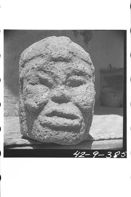 Sculpted stone head with tenon