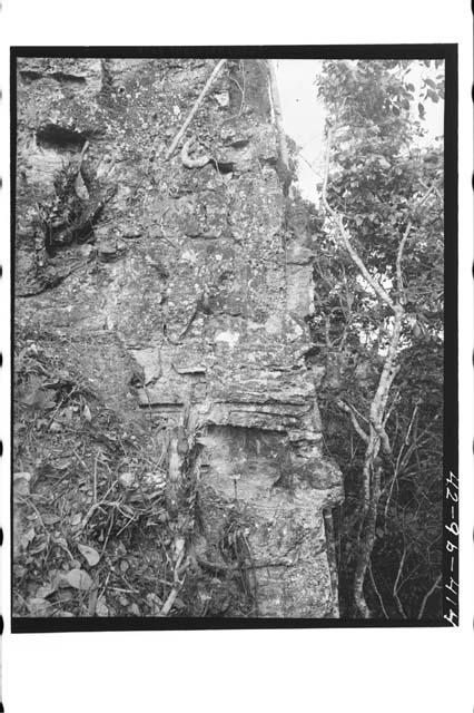 Great Temple II NE corner of roofcomb at base