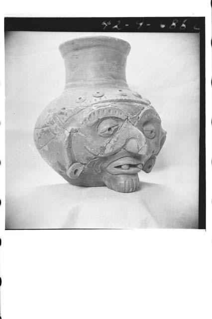 Plumbate "old man" effigy jar