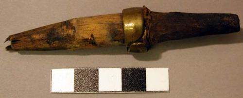 Tool, unclassified, carved wooden peg, tapered ends, brass ring at middle