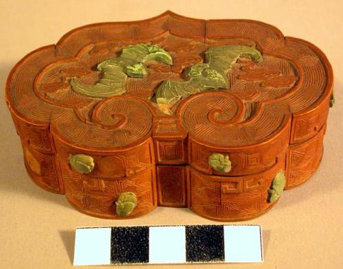 Wooden box containing wooden fly