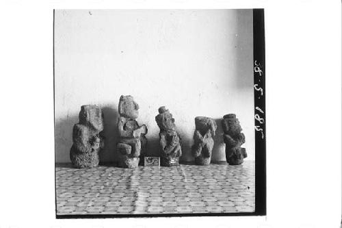 Five stone figurines (Right profile)