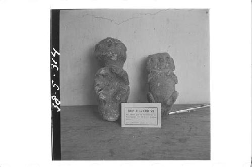 2 small stone figures (front)