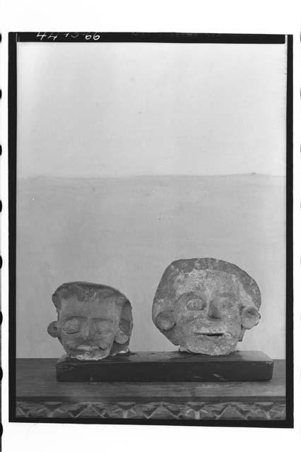 Two pottery figurine heads