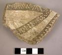 Black-on-white potsherds