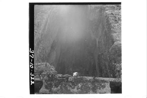 Looking west and up at the vault of the roof comb of Structure 6