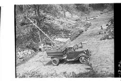 Truck and scaffolding used to photograph the pavement of the ballcourt