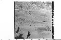 Looking down and W. across Str. 2A. trench T-45-1 in center foreground with part