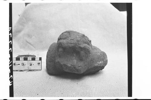 Animal effigy stone figure with shallow cup cut in back -- incensario?