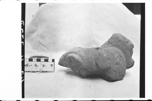 Animal effigy stone figure with shallow cup cut in back -- incensario?