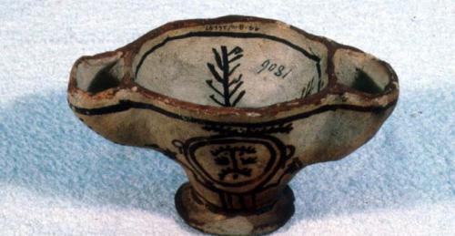 Eccentric vessel, polacca polychrome style c. 8.4 x 15.5 x 9.1 cm.