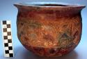 Red pottery vessel with incised designs. Tachu