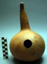 Gourd vessel with hole on side. Luwoko