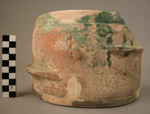 Broken glazed clay jar