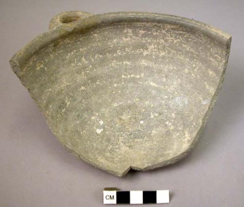 Broken shallow gray pottery vessel with handles (5 sherds)