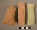 Potsherds (5); vessel handle fragments.