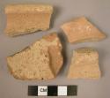 Ceramic rim and body sherds, undecorated brown ware