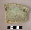 Ceramic rim sherd, white glazed interior, blue glazed exterior