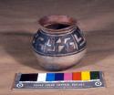 Jar, polacca polychrome (early). linear design. 9.8 x 11.4 cm.