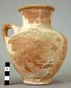 Pottery vessel-single shoulder handle; brown burnished; horizontally striated on