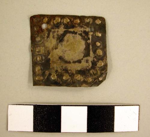 Thin, square piece of silver - repousse, perforation in each corner +