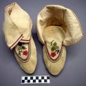 Pair of leather moccasins with floral embroidery