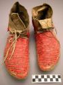 Pair of Sioux moccasins. Rawhide soles w/ soft uppers