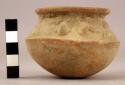 Small rounded-bottom pottery vessel - incised and punctated