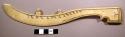 Knife or "mush stick," ivory. Blade is sharply curved and sharpened near tip.