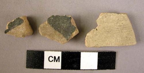 3 potsherds - dark green and tan glaze