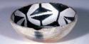 Black on white pottery bowl