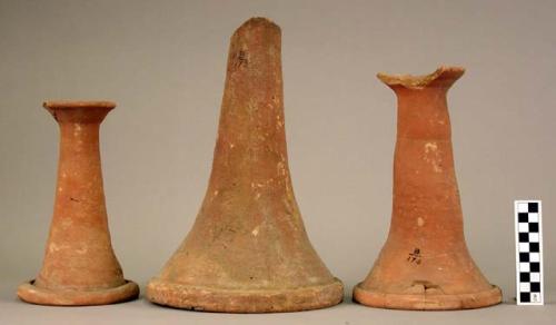 Terra cotta flaring slender pottery vessels