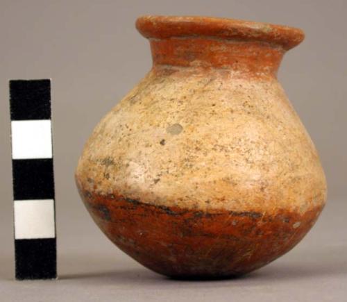 Pottery jar, base red, upper zone white with black ornamentation