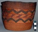 Small basket--horizontal, zigzag design of yellow, brown on dark ground