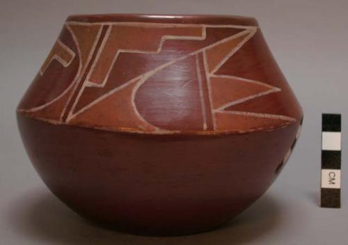 Red-on-red carinated bowl