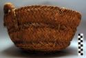 Carrying basket made of coconut fiber